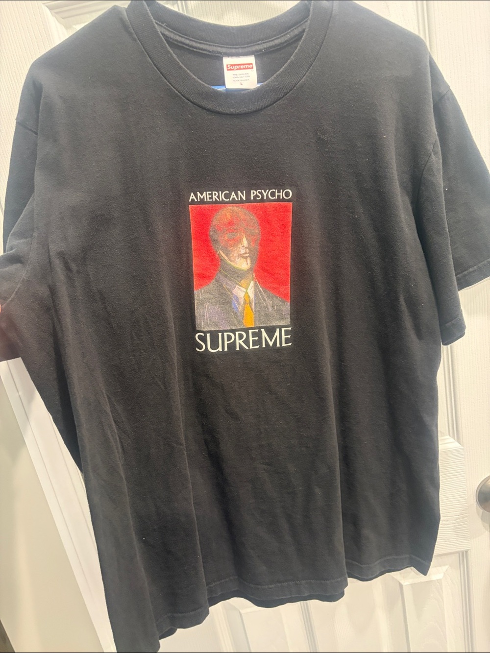 Supreme Black American Psycho Graphic Tee with Red Yellow Accents